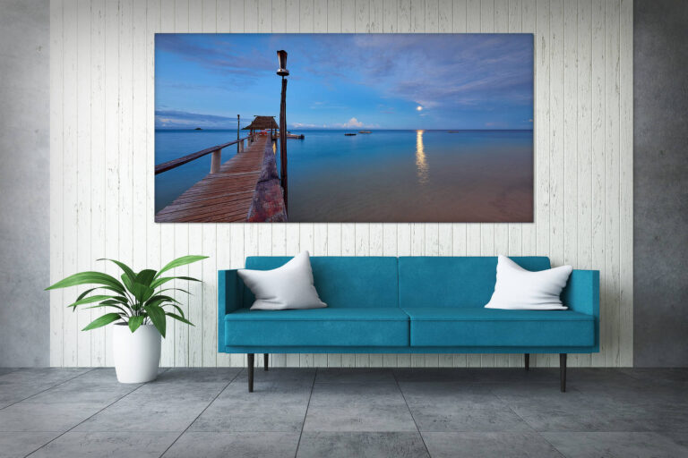 Conference room interior with white brick walls, a concrete floor, large windows and a long wooden table with wooden chairs near it. Side view. 3d rendering mock up